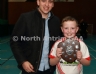 Aaron McHendry from Central Bar Ballycastle presenting Cuchullains Eoghan Ruadh 2 Dungannon team captain Ryan McBride with the North Antrim Central Bar Division 2 Indoor Hurling league shield